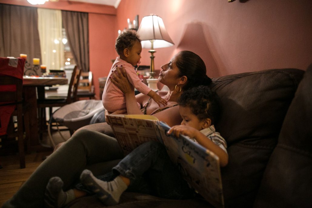 mother with two children at home